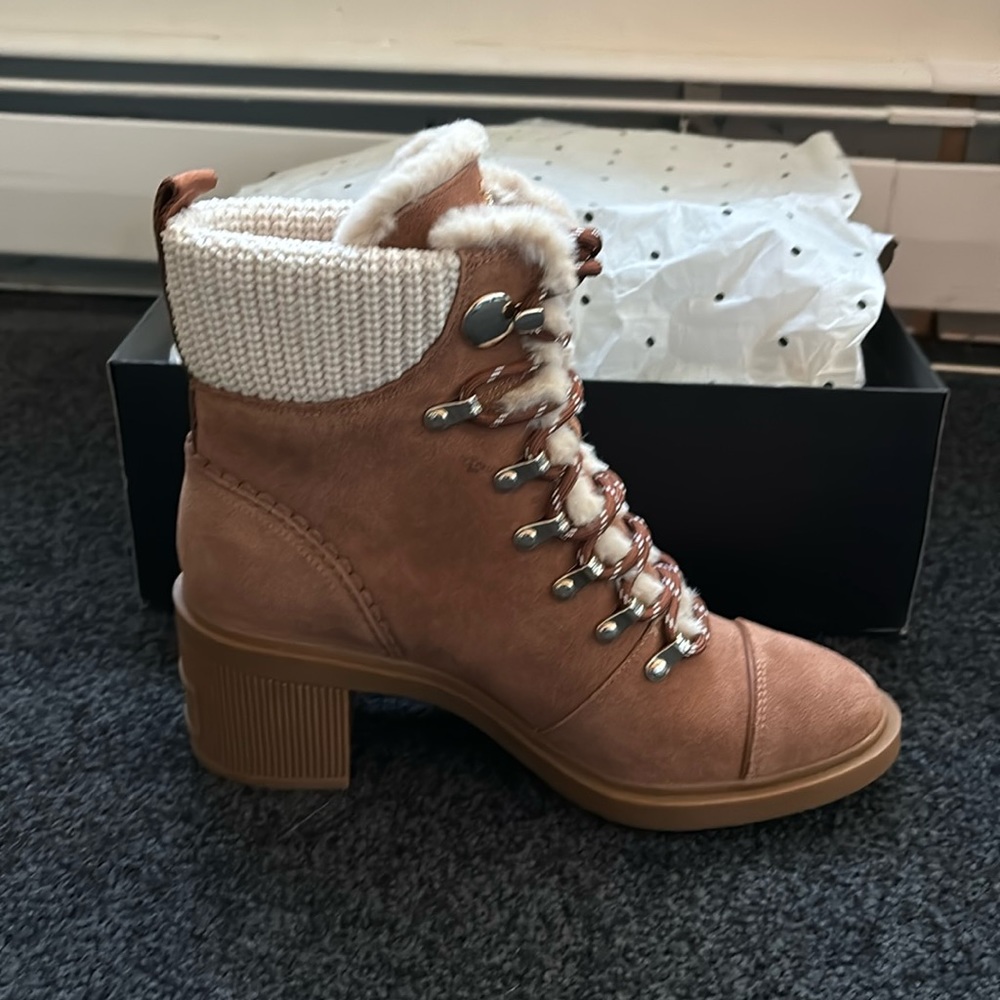 Kate Spade boots. New, in box. One shoe is still wrapped up.